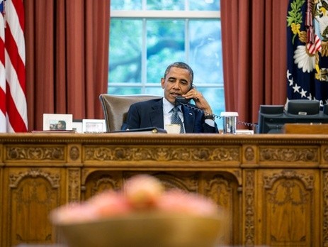 Обама и Путин провели телефонный разговор по ситуации в мире - ảnh 1